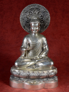 Zilverkleurig Boeddhabeeld met Dharmachakra mudra