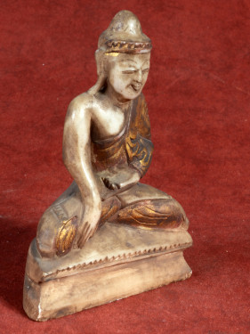 Albasten Boeddha in Bhumisparsha met goudaccenten