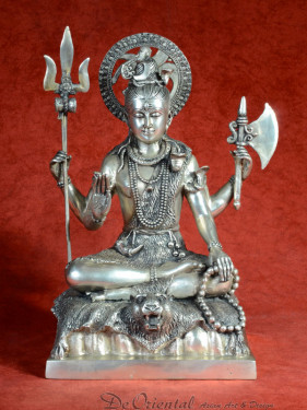 Shiva zittend