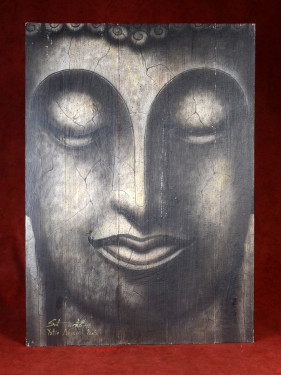 Hoofd van Boeddha op houten paneel
