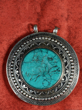 Zilveren hanger met turquoise en paardenmotief