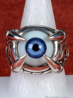 Zilveren draakklauw ring met donker blauw oog