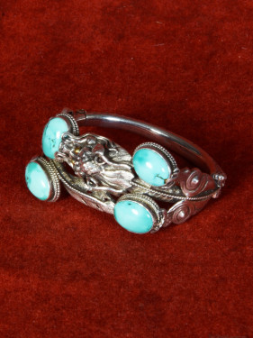 Sterling zilveren armband met turquoise en drakenmotief