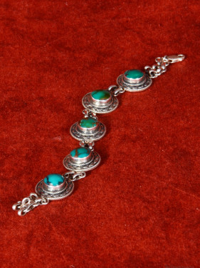 Zilveren armband met turquoise cabochons