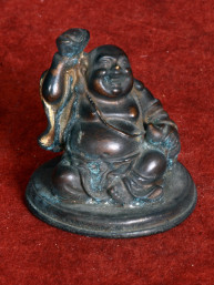 Bronzen Happy Boeddha beeldje met goudklomp en knapzak