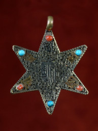 Hanger ster met Om mani padme hum tekst