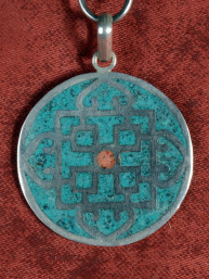 Zilveren hanger met turquoise mandala en koraalaccent