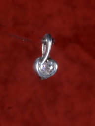 Bergkristal hanger van een zilver hartje