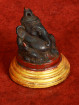 Oud Ganesha Beeldje met Goudrode Sokkel