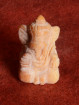 Ganesha miniatuur handgesneden versteend hout Thailand