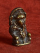 Oud bronzen Ganesha amulet met aureool