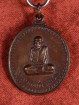 Ajarn Mun amulet – rian met bedelnap symbool, koper