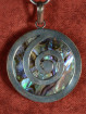 Zilveren hanger met paua schelp en spiraaldesign