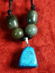Halsketting met turkoois hanger en jade kralen