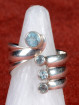 Zilveren ring met vier blauwe topaasstenen