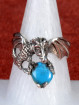 Zilveren drakenring met turquoise steen