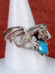 Zilveren drakenring met turquoise steen