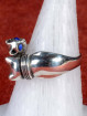 Zilveren ring met dubbele kattekoppen en blauwe ogen