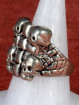 Biker Skull Ring met vier doodshoofden en een kruis