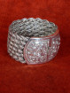Brede sterling zilveren armband met florale sluiting