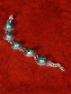 Zilveren armband met turquoise cabochons