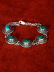 Zilveren armband met turquoise cabochons
