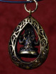 Bronzen hanger van vier armige Ganesha, met groene zirkoontjes