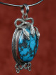 Turkoois hanger met zilveren slangen