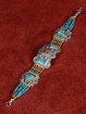 Schakelarmband Tibet, turkoois en bamboekoraal