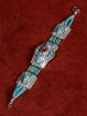 Schakelarmband Tibet, turkoois, malachiet en bamboekoraal